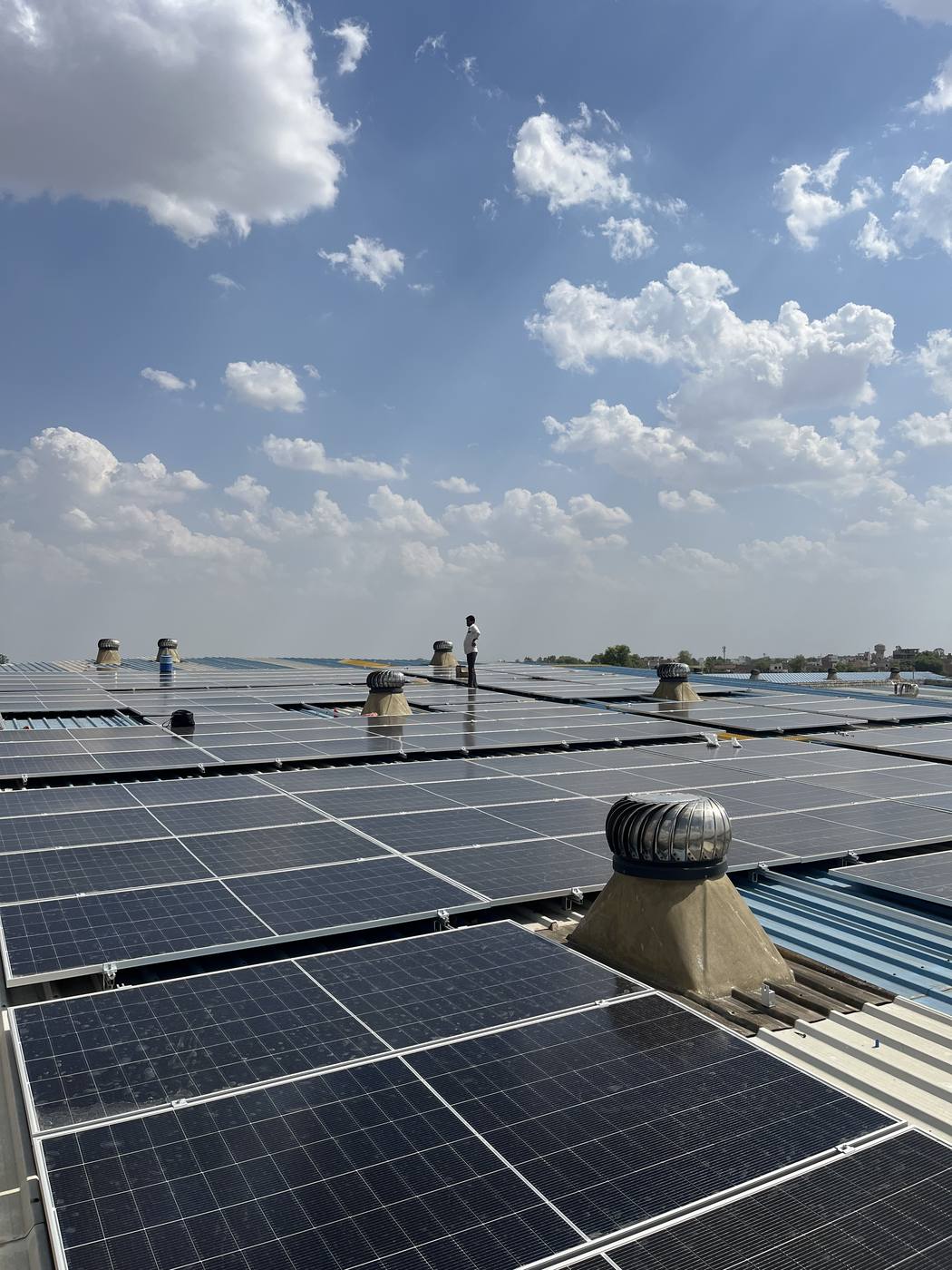 Solar panels on an industrial tin-shed roof